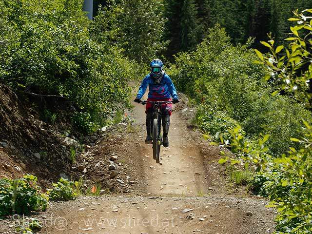 mountain biking a-line at whistler bike park